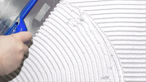 installation of Manti Ceramic with trowel